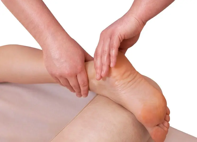 Physiotherapist Examination and Massage of the Patient's Foot